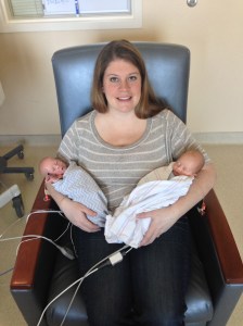 First time holding both babies at the same time.